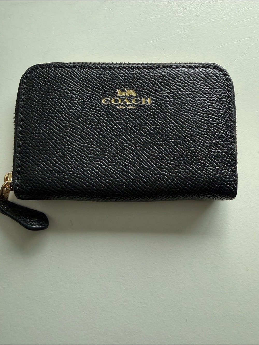 COACH Black Pebbled Leather Zip Card Holder with Gold Logo